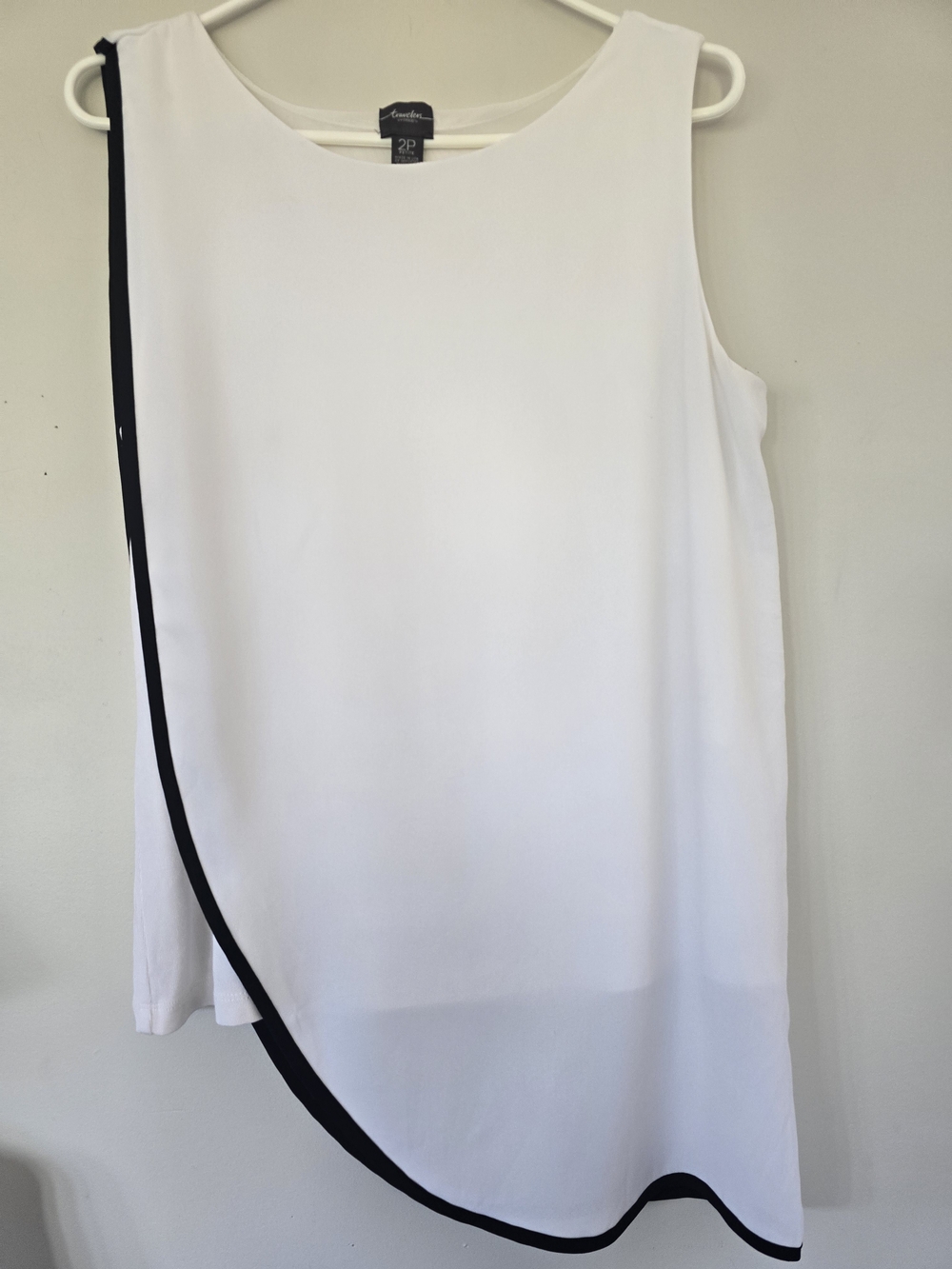 White Sleeveless Asymmetrical Blouse with Black Trim. Size 2P 2X